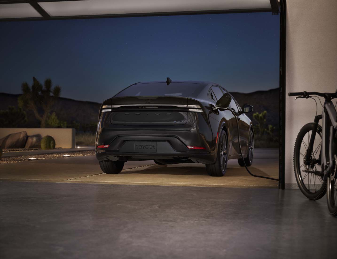 Rear_view_toyota_sedan_charging_in_garage%402x.jpg