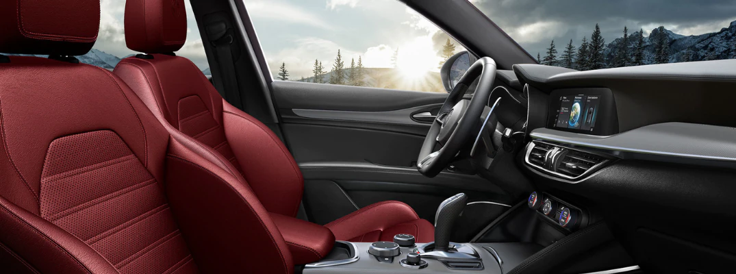2026 Alfa Romeo Tonale red passenger and driver Interior