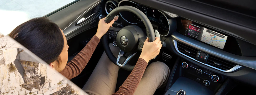 Overhead angle of woman driving the 2026 Alfa Romeo Stelvio