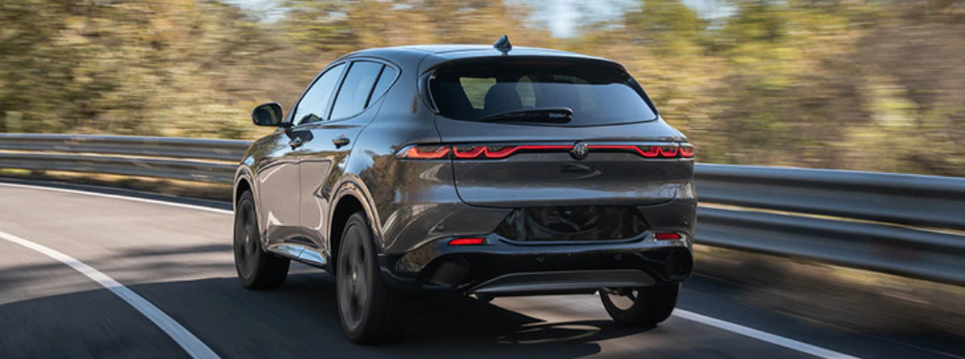 2026 Alfa Romeo Tonale Rear Driving down the back roads