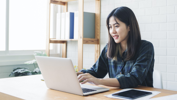 Unknown person on laptop 
