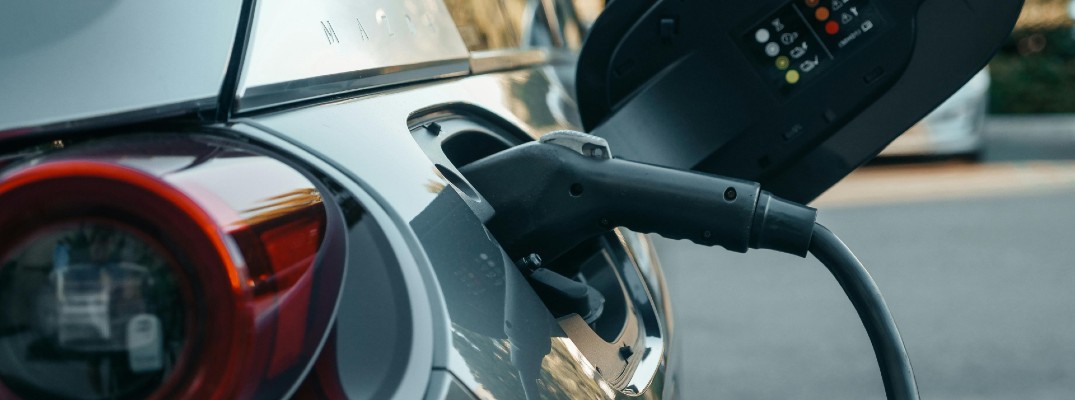 A stock photo of an EV being charged.