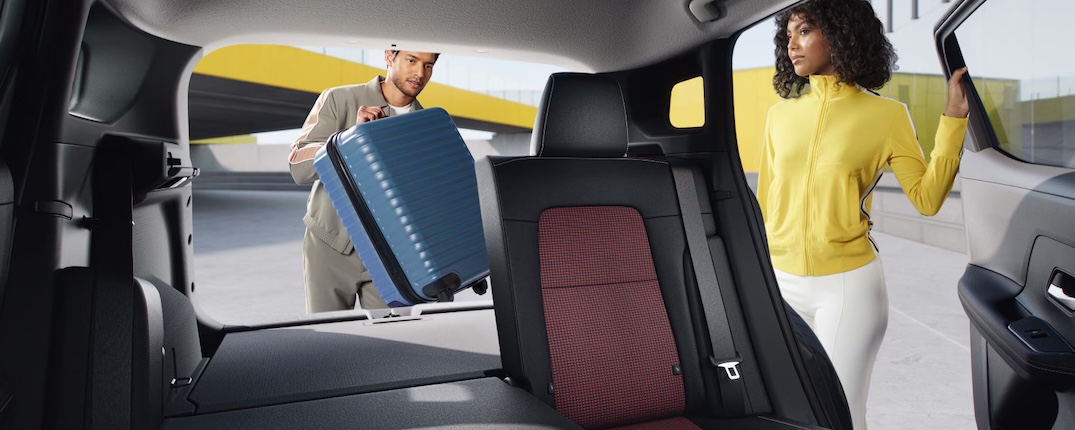 Two people load their cargo into the 2026 Nissan Kicks.