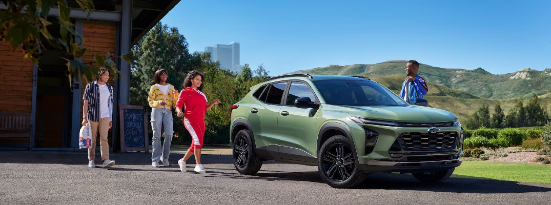A photo of people getting into a 2026 Chevrolet Trax.