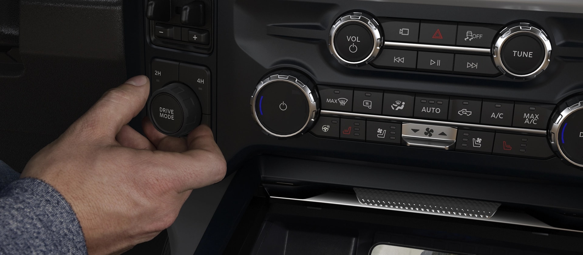 Close up of person adjusting drive mode dial on 2026 Ford Super Duty