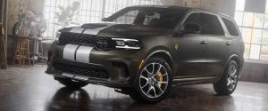 A green 2026 Dodge Durango with white stripes on the hood. New 2026 Dodge Durango interior cabin guide at Blenheim Chrysler Dodge Jeep Ram in Blenheim, ON