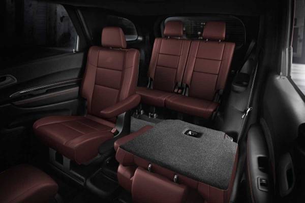 The interior of a 2026 Dodge Durango with a seat folded flat.ew 2026 Dodge Durango interior cabin guide at Blenheim Chrysler Dodge Jeep Ram in Blenheim, ON