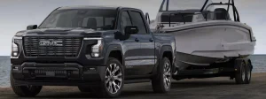 2027 GMC Sierra 1500 towing a boat