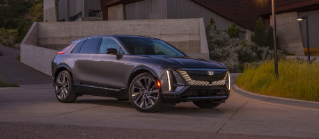 grey_lyriq_parked_in_driveway_at_dusk.jpg