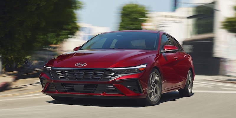 The exterior of a red 2025 Hyundai Elantra.