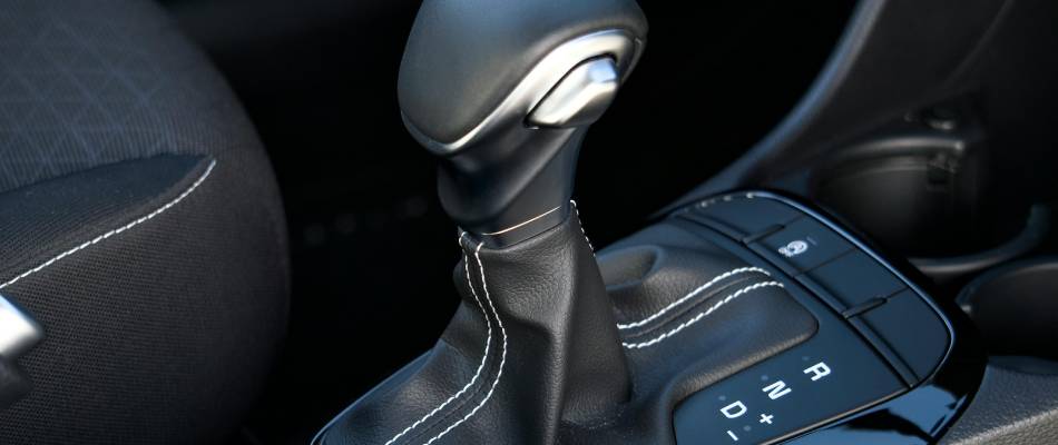 A close-up of a vehicle's automatic gear shift. Hyundai transmission service at Calgary Hyundai in Calgary, AB