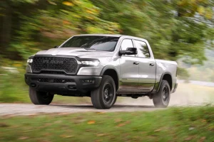 A Ram Truck driving through a forest