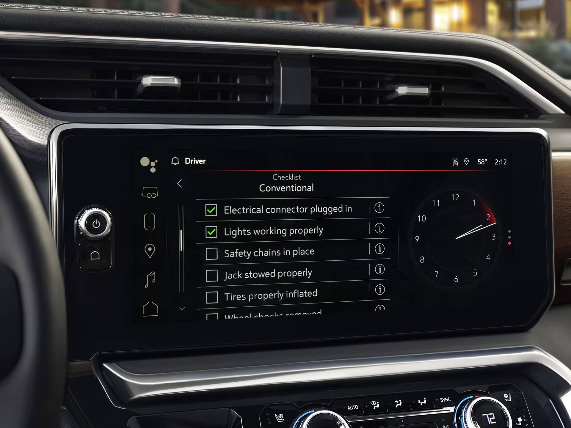 The 2026 GMC Sierra 1500's screen displays a pre-departure towing checklist as part of its onboard trailering suite