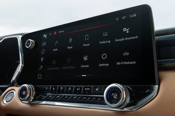 The dashboard touchscreen of the 2026 GMC Canyon showing app widgets, including the in-vehicle trailering app. New 2026 GMC Canyon towing specs at College Park GM in Vermilion, AB