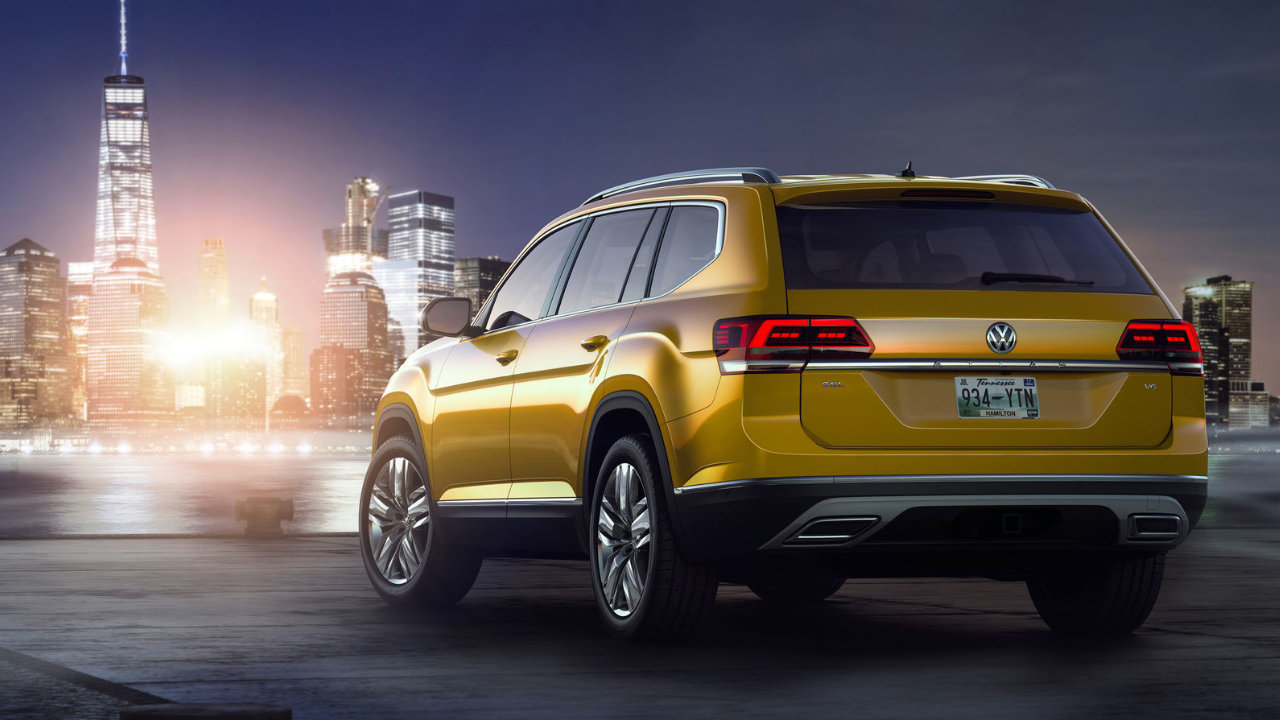 rear side view of a 2023 VW Atlas in town