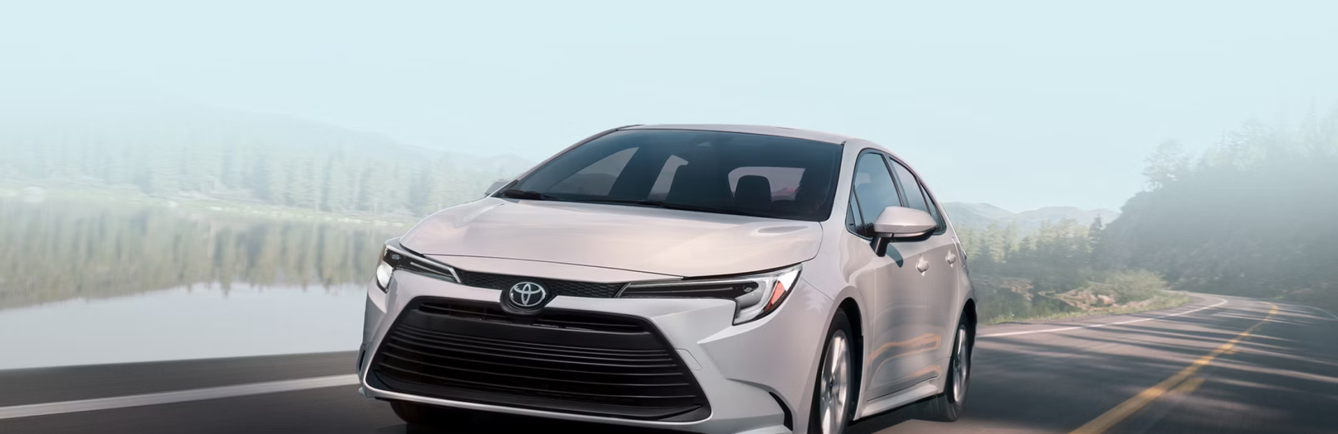 _toyota-warranty-coverage-new-vehicle-2026-corolla-hybrid-le-white-lineup