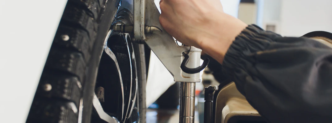 Mechanic checking tire
