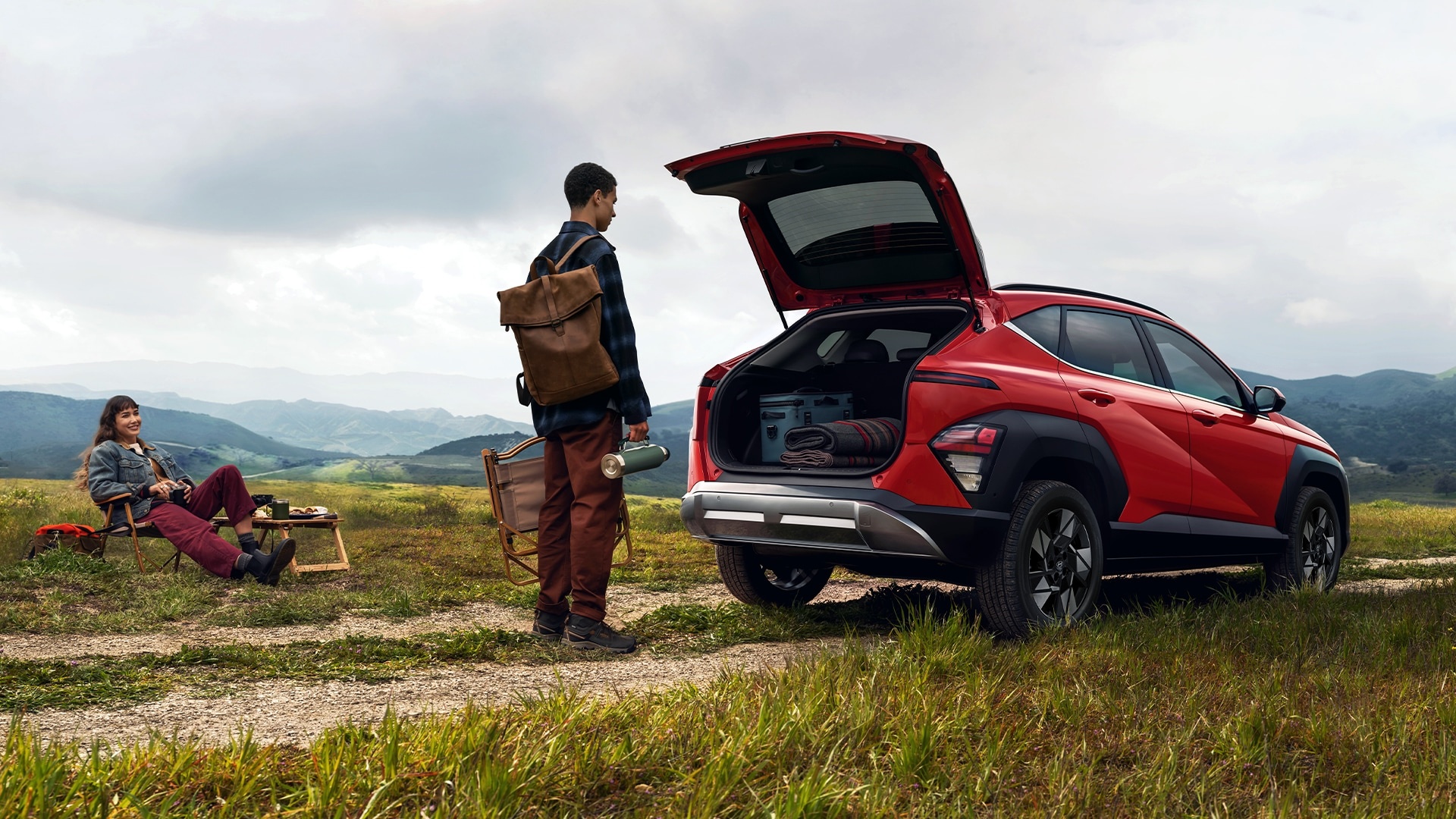 Man loading cargo into the 2026 Hyundai Kona