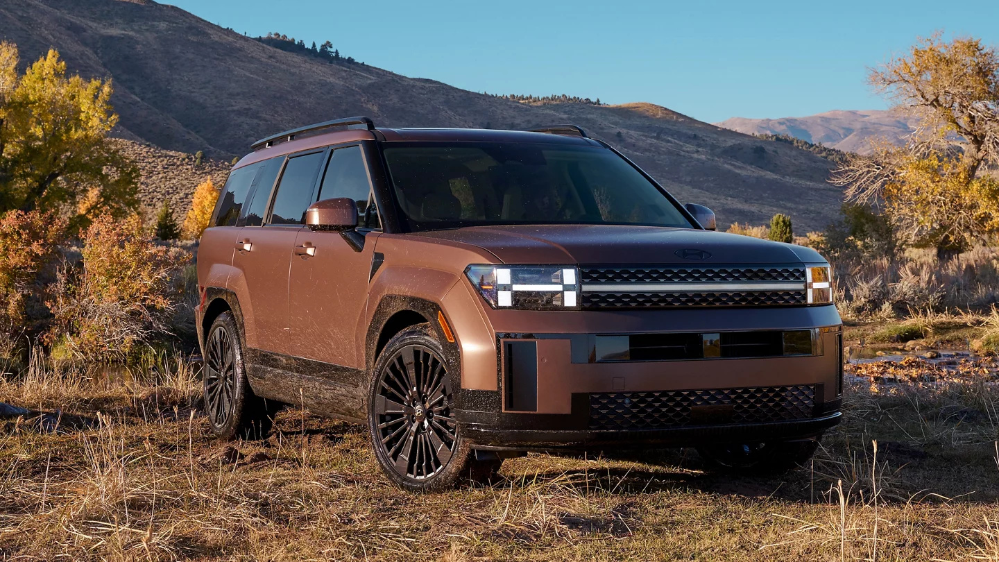 2025 Hyundai Santa Fe Hybrid parked on grass