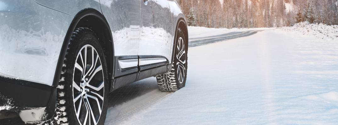 Vehicle driving through snow