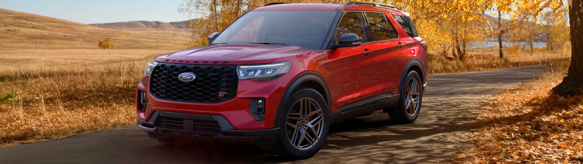 2025 Ford Explorer parked with orange trees in background