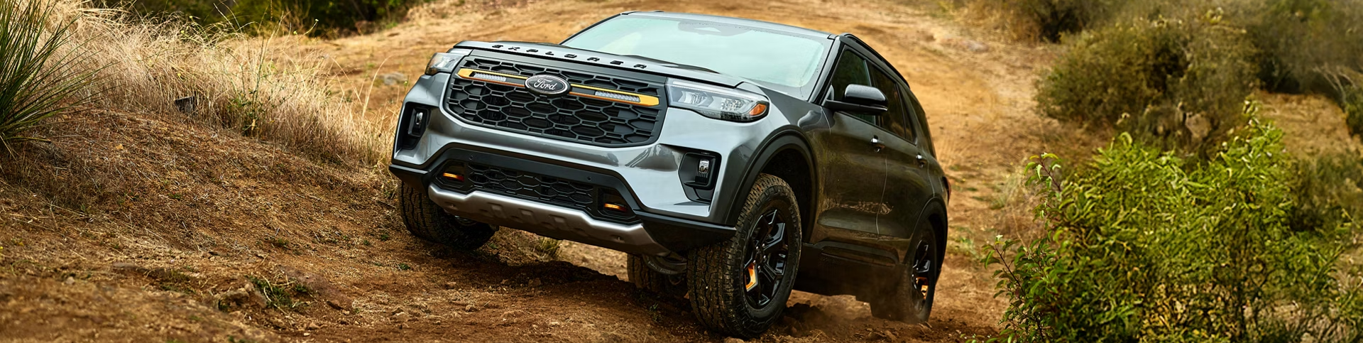 2026 Ford Explorer driving on dirt path