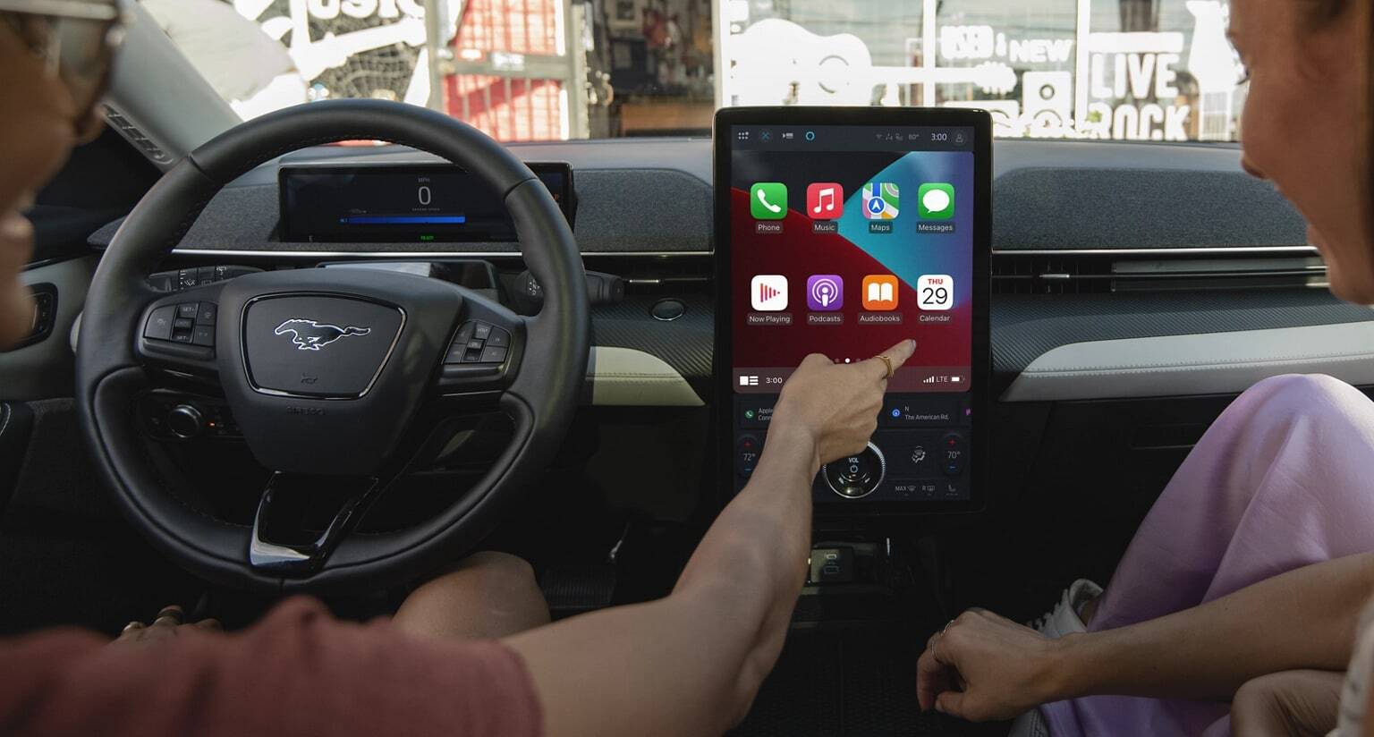 Unknown person using centre display inside 2025 Ford Mustang Mach-E