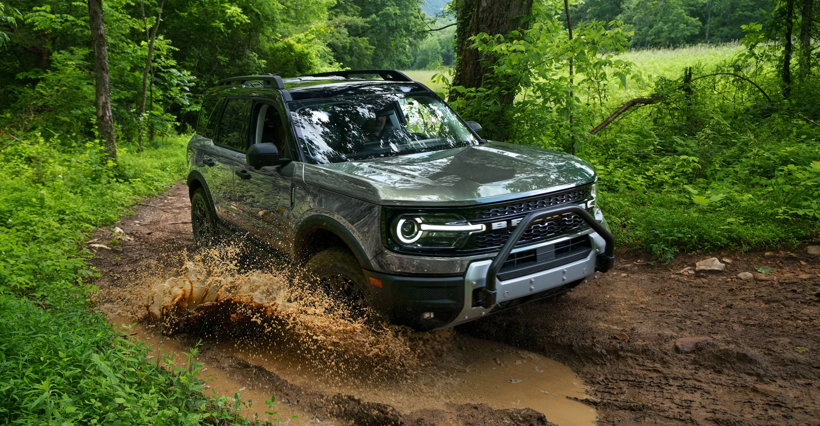 2026 Bronco Sport driving through muddy terrain
