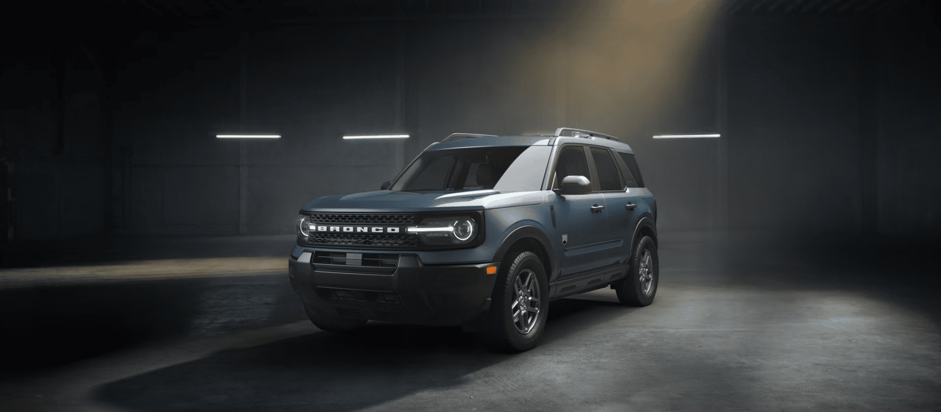 2025 ford bronco sport bigbend in azuregrey parked inside garage