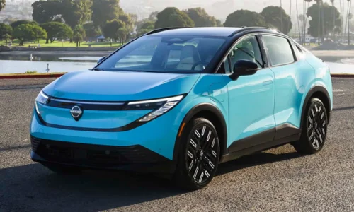 2026 Nissan Leaf electric hatchback parked near the waterfront, featured by DRIVEN Newmarket as an affordable and efficient EV option.