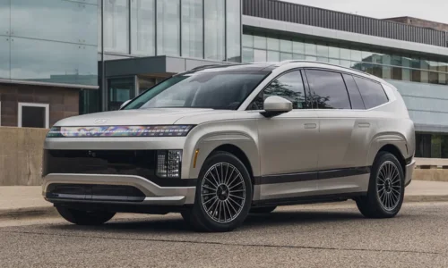 2026 Hyundai IONIQ 9 electric SUV parked outside a modern building, featured by DRIVEN Newmarket as a premium three-row EV.