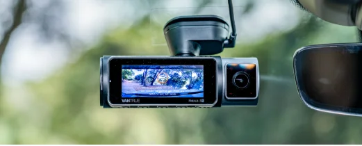 Vantrue N5S dash cam mounted on a windshield displaying road footage, featured by DRIVEN Newmarket for advanced vehicle recording and safety.