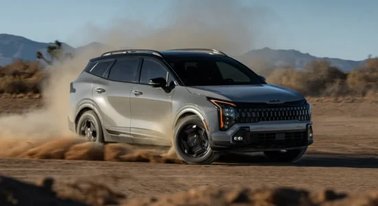 2026 Kia Sportage SUV driving on a dusty off-road trail, featured by DRIVEN Newmarket as a bold and capable compact SUV.