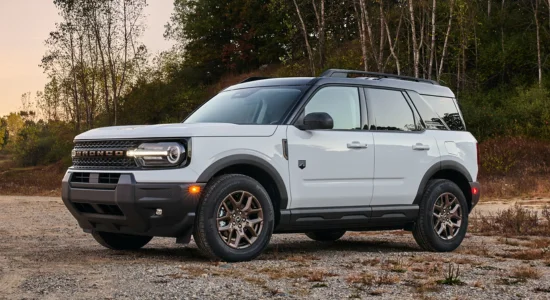 2026 Ford Bronco Sport SUV parked on a gravel trail surrounded by trees, featured by DRIVEN Newmarket as a rugged and adventure-ready SUV.