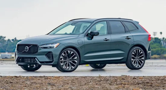 2026 Volvo XC60 Hybrid luxury SUV parked on an open road, featured by DRIVEN Newmarket as a premium hybrid SUV for Canadian drivers.