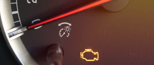 Dashboard warning icon showing the check engine light illuminated, explaining Why Is My Check Engine Light On with insights from DRIVEN Newmarket.