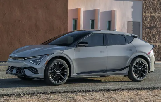 Silver Kia EV6 AWD (2022+) electric crossover parked outdoors, featured by DRIVEN Newmarket as a modern all-wheel-drive EV.