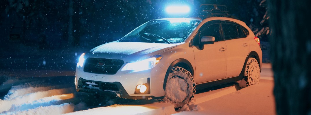 A stock photo of vehicle in deep snow.