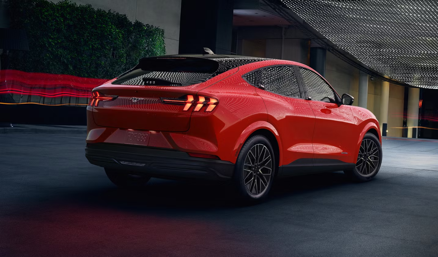 2026 Ford Mustang Mach-E driving down road