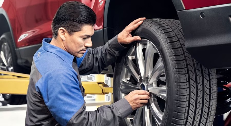 Technician changing tire