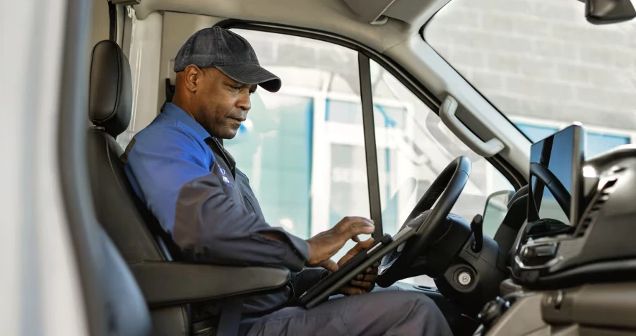 Unknown person sitting in driver's seat of 2026 Ford E-Transit
