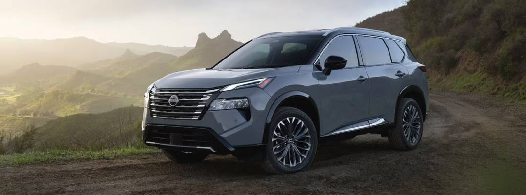 2026 Nissan Rogue driving on dirt pathway