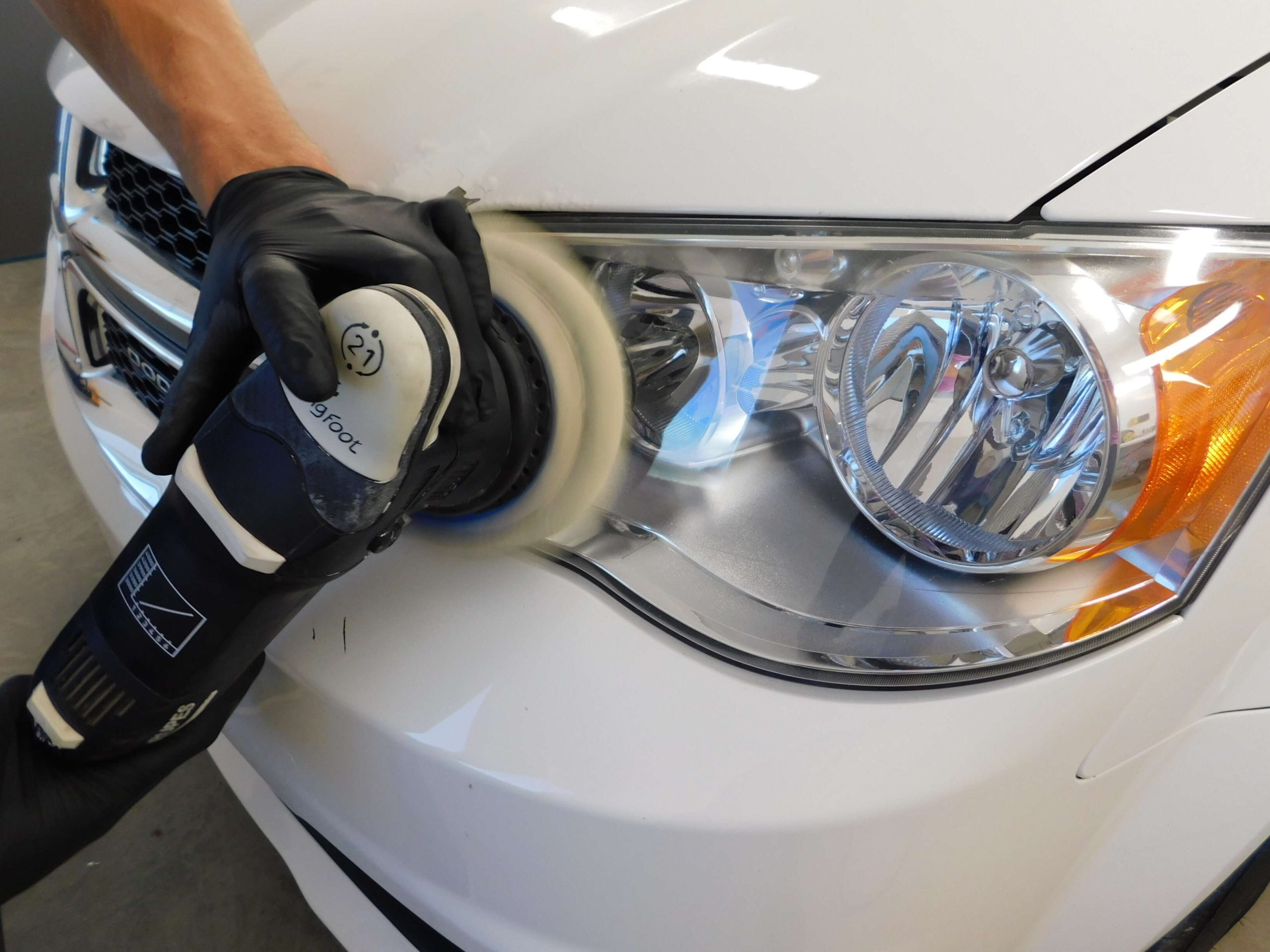 Headlight restoration polishing