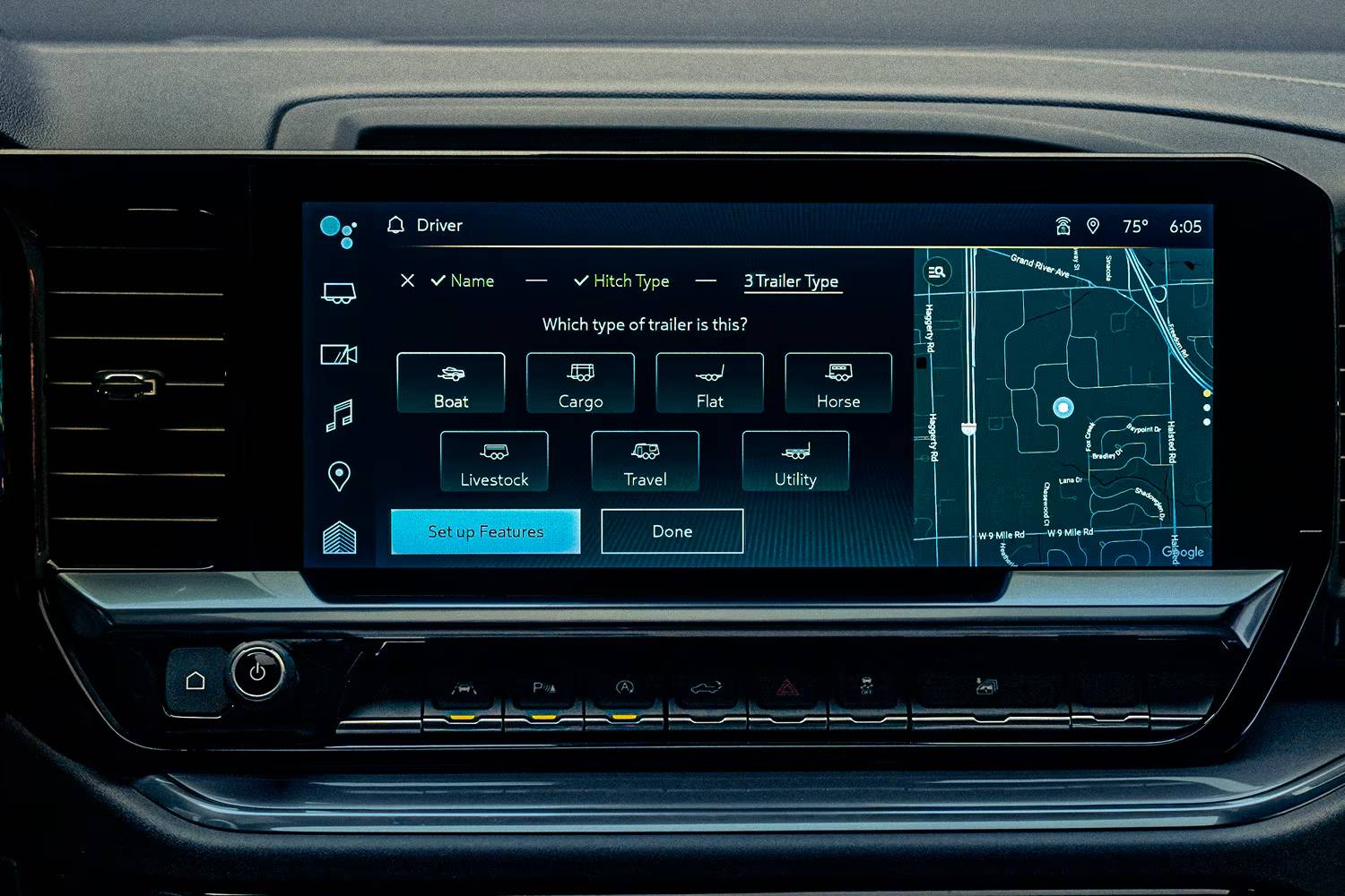 The dashboard screen aboard a 2026 Chevrolet Silverado 1500. Shows a map, hitch type, and more options.
