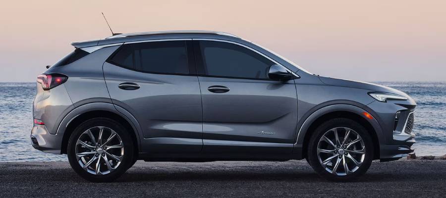 side-on view of a silver 2026 Buick GX at sunset. New 2026 Buick Encore GX for sale at Gardner Chevrolet Buick GMC in Hope, BC