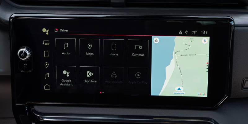 The infotainment screen of a 2026 GMC Sierra 2500 & 3500 HD displaying a map and app widgets. New 2026 GMC Sierra HD towing and engine specs at Gardner GM in Hope, BC