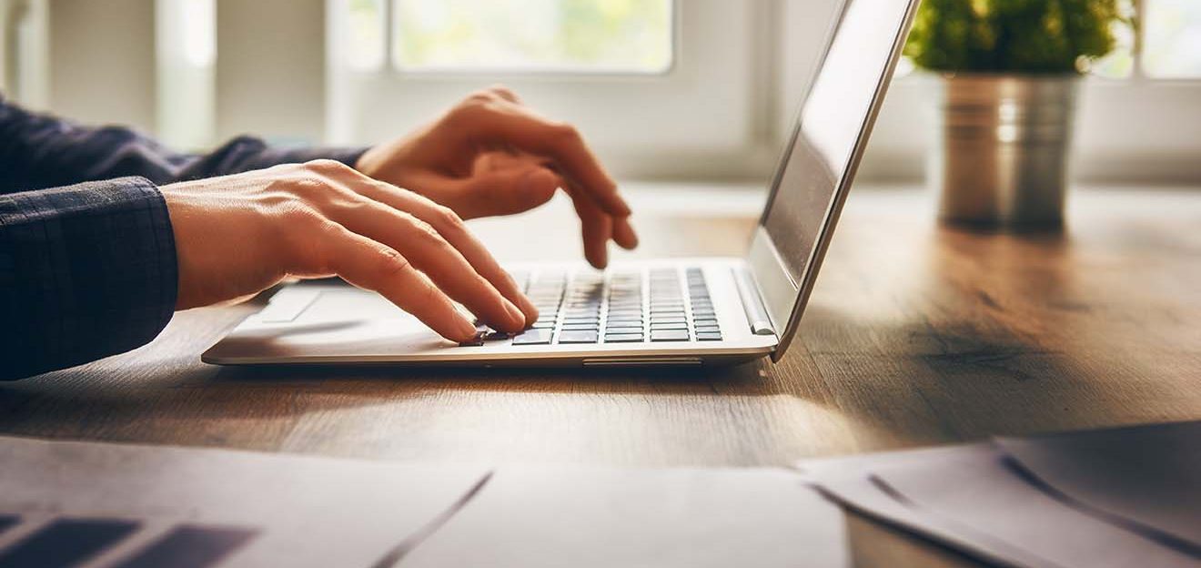 businessman using laptop computer sitting working office.