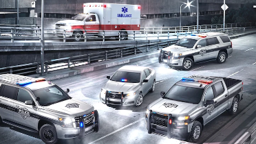 GM police vehicles parked on road