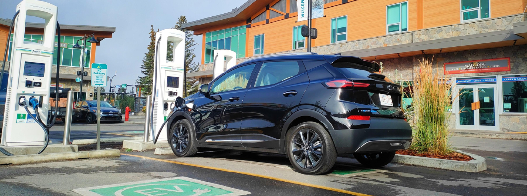 Electric Vehicle (EV) at a charging station.