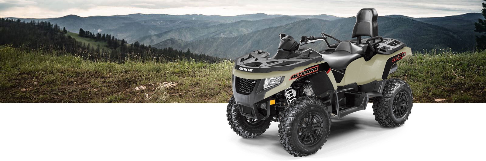 Front side view of Alterra TRV 700 on mountain background